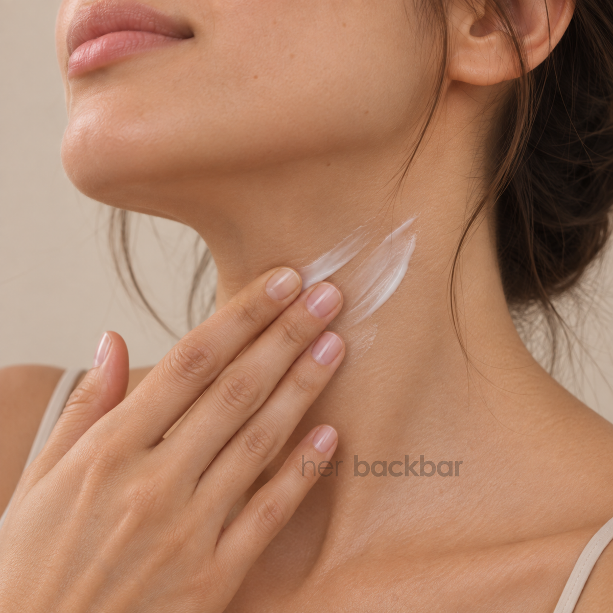 Close-up of KrX Neck Lift Intensive Firming Cream being applied to the neck
