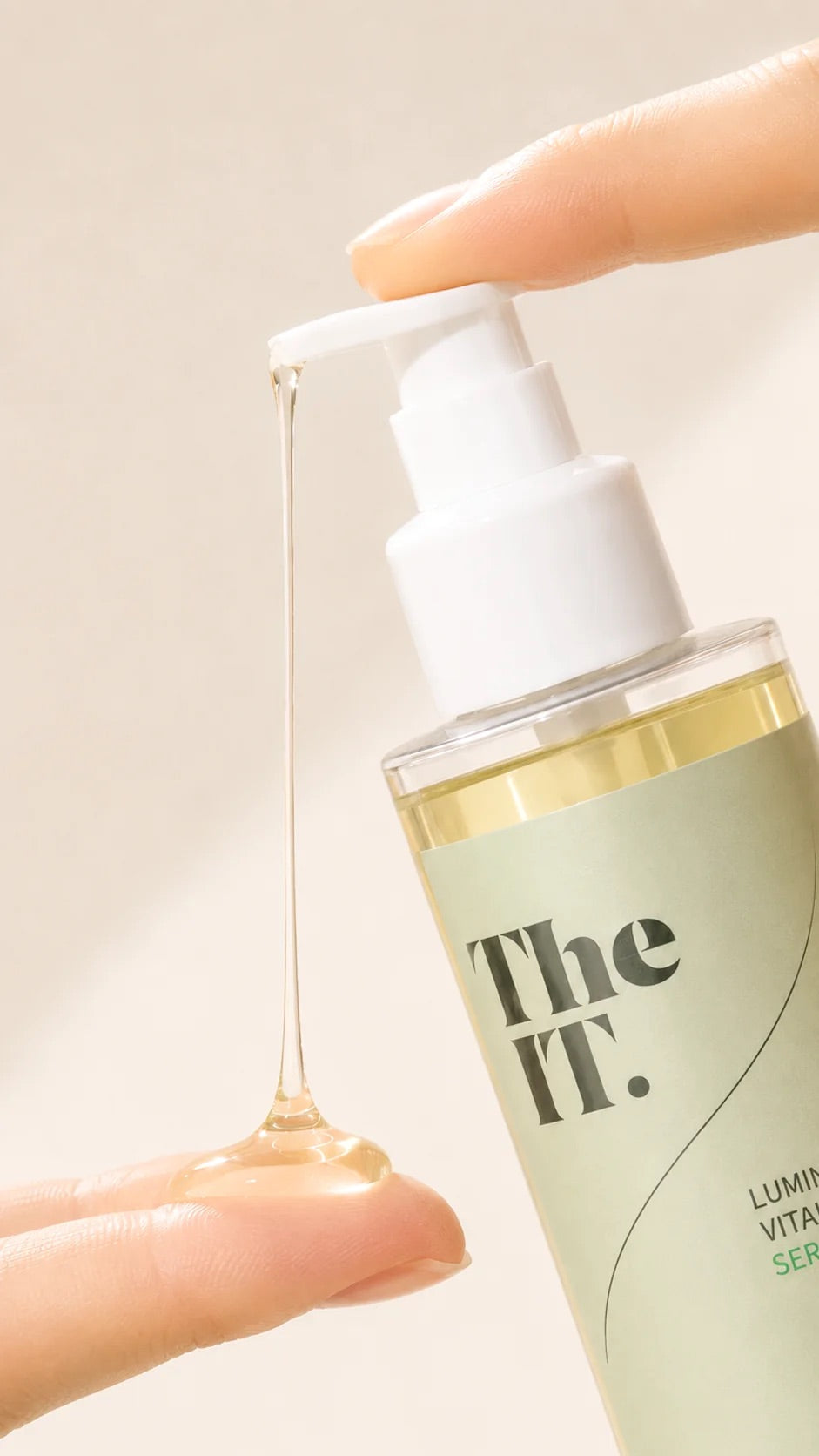 The It by Celldraw Luminous Vital Serum lightweight hydrating serum texture with pump dispenser