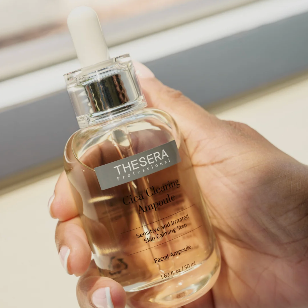 Thesera Cica Clearing Ampoule balancing serum for sensitive, oily and congested skin held in hand